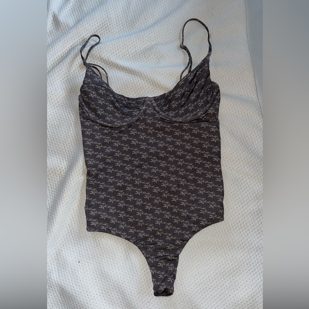 Mai One piece size small
